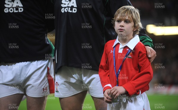 28.11.09 - Wales v Australia - Invesco Perpetual Series 2009 - Mascot Tomas Bennett lines up for the national anthems. 