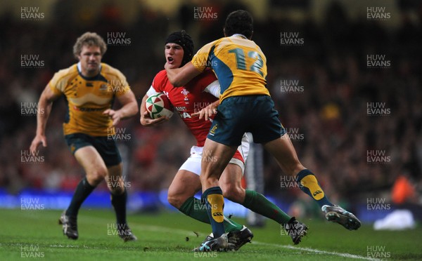 28.11.09 - Wales v Australia - Invesco Perpetual Series 2009 - Wales' Tom James is tackled by Australia's Quade Cooper. 