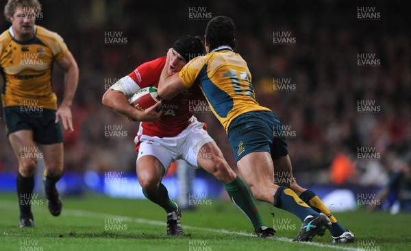 28.11.09 - Wales v Australia - Invesco Perpetual Series 2009 - Wales' Tom James is tackled by Australia's Quade Cooper. 
