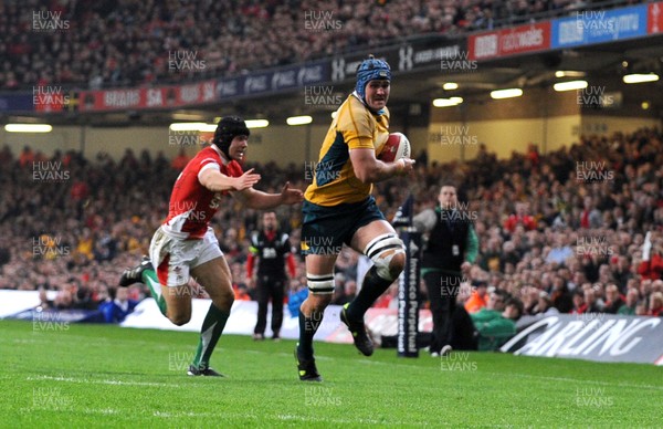 28.11.09 - Invesco Perpetual International Rugby, Wales v Australia Australia's James Horwill geat past Wales' Leigh Halfpenny to score try 