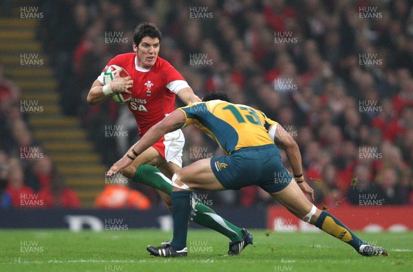 28.11.09... Wales v Australia, Invesco Perpetual 2009 Series -  Wales' James Hook is tackled by Australia's Digby Ioane  