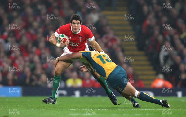28.11.09... Wales v Australia, Invesco Perpetual 2009 Series -  Wales' James Hook is tackled by Australia's Digby Ioane  