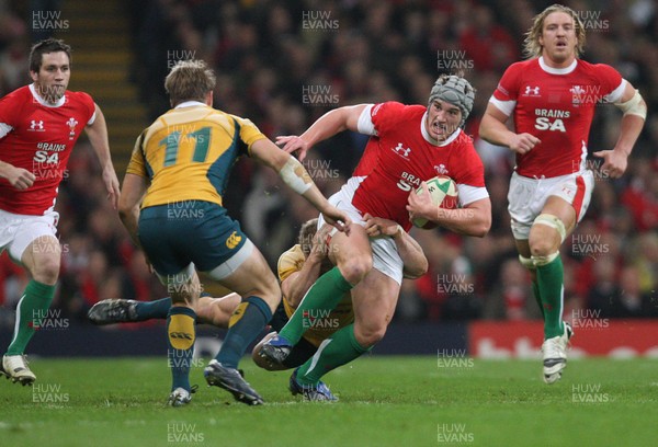 28.11.09... Wales v Australia, Invesco Perpetual 2009 Series -  Wales' Jonathan Davies is tackled 