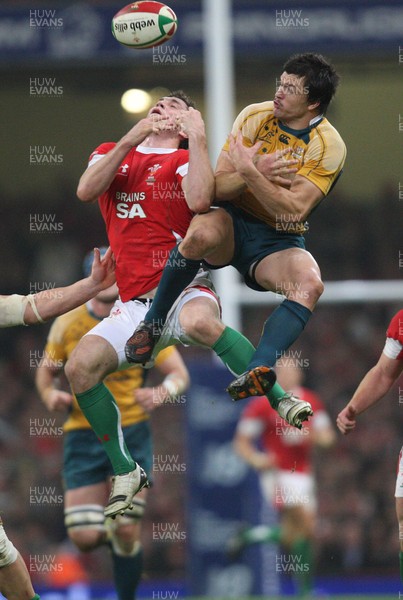28.11.09... Wales v Australia, Invesco Perpetual 2009 Series -  Wales' Andrew Bishop is challenged by Australia's Adam Ashley-Cooper for the high ball 