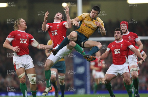 28.11.09... Wales v Australia, Invesco Perpetual 2009 Series -  Wales' Andrew Bishop is challenged by Australia's Adam Ashley-Cooper for the high ball 