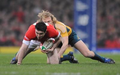 29.11.08 - Wales v Australia - Invesco Perpetual Series 2008 - Wales' Stephan Jones is tackled by Australia's Ryan Cross. 