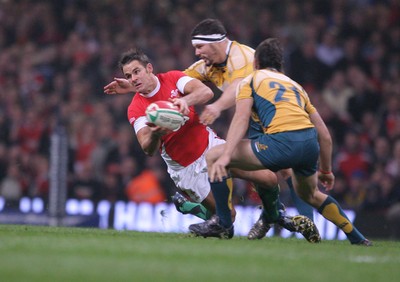 29.11.08 Wales v Australia... Wales' Lee Byrne is tackled by Australia's Al Baxter. 