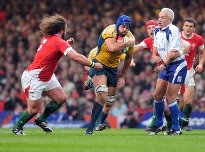 29.11.08 - Invesco Perpetual Series 2008 Wales v Australia Referee Peter Alan gets in the way of Wales' Alun Wyn Jones assisting Adam Jones tackle Australia's Nathan Sharpe 