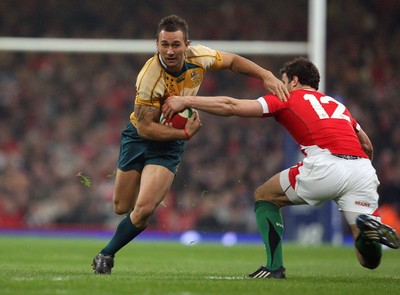29.11.08 ... Wales v Australia, Invesco Perpetual Series 2008. -  Australia's Quade Cooper takes on Wales' Jamie Roberts  