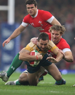 29.11.08 ... Wales v Australia, Invesco Perpetual Series 2008. -  Australia's Quade Cooper is tackled by Wales' Andy Powell   