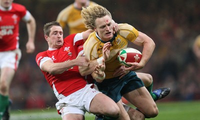 29.11.08 ... Wales v Australia, Invesco Perpetual Series 2008. -  Australia's Ryan Cross is tackled by Wales' Shane Williams and Tom Shanklin 