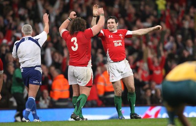 29.11.08 ... Wales v Australia, Invesco Perpetual Series 2008. -  Wales' Stephen Jones and Adam Jones celebrate as the final whistle blows  