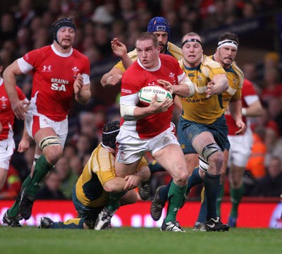 29.11.08 Wales v Australia... Wales' Gethin Jenkins is tackled by Australia's Benn Robinson. 