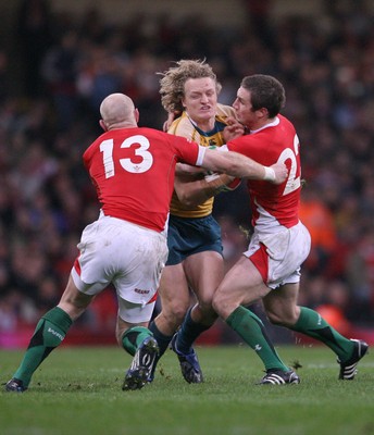 29.11.08 Wales v Australia... Australia's Ryan Cross is tackled by Tom Shanklin and Andrew Bishop. 