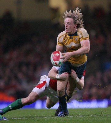 29.11.08 Wales v Australia... Australia's Ryan Cross is tackled by Tom Shanklin. 