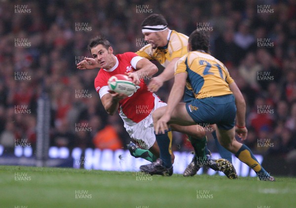 29.11.08 Wales v Australia... Wales' Lee Byrne is tackled by Australia's Al Baxter. 