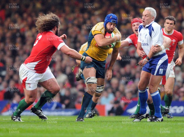 29.11.08 - Invesco Perpetual Series 2008 Wales v Australia Referee Peter Alan gets in the way of Wales' Alun Wyn Jones assisting Adam Jones tackle Australia's Nathan Sharpe 