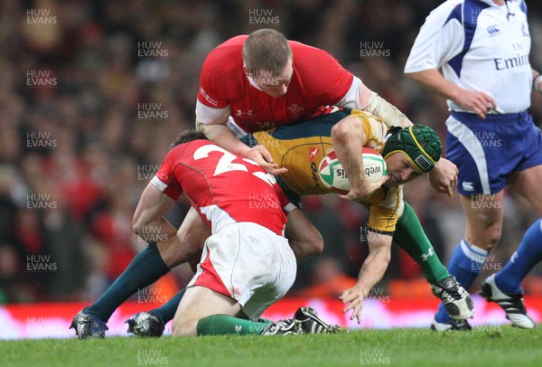 29.11.08 ... Wales v Australia, Invesco Perpetual Series 2008. -  Wales' Andrew Bishop and Gethin Jenkins tackle Australia's Matt Giteau   