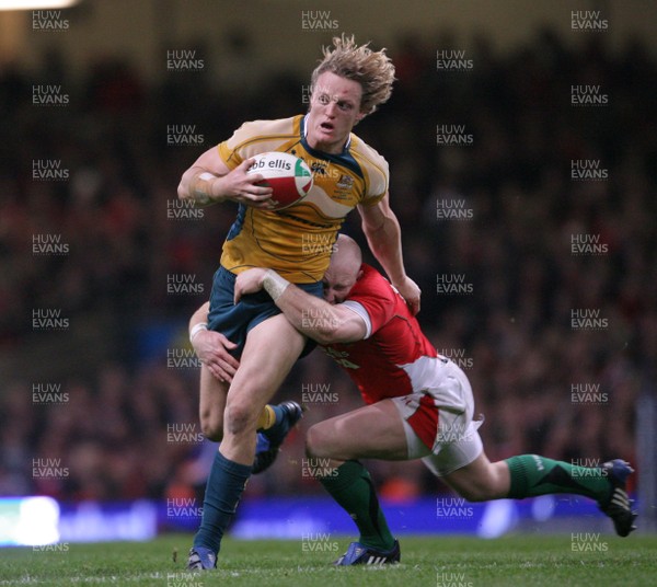 29.11.08 Wales v Australia... Australia's Ryan Cross is tackled by Tom Shanklin. 