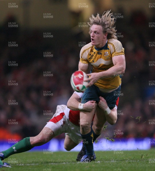 29.11.08 Wales v Australia... Australia's Ryan Cross is tackled by Tom Shanklin. 