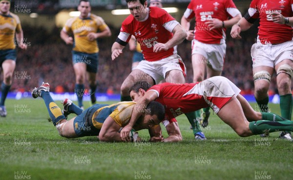 29.11.08 Wales v Australia... Australia's Digby Ioane scores try despite tackle by Lee Byrne. 