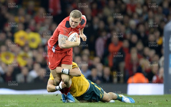 301113 - Wales v Australia - Dove Men Series 2013 -Owen Williams of Wales is tackled by Christian Leali-ifano of Australia