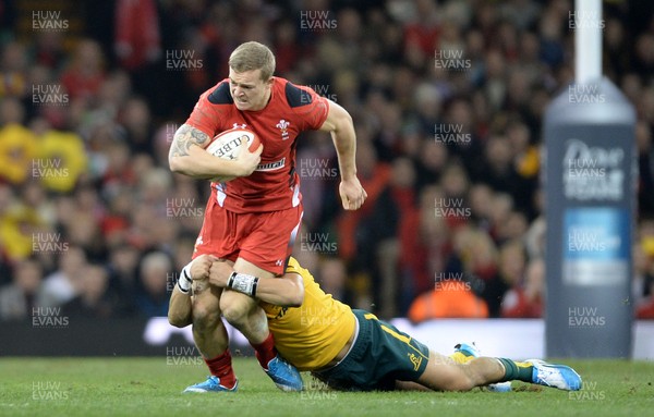 301113 - Wales v Australia - Dove Men Series 2013 -Owen Williams of Wales is tackled by Christian Leali-ifano of Australia