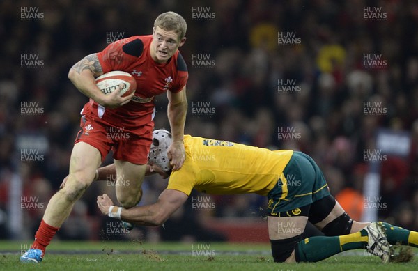 301113 - Wales v Australia - Dove Men Series 2013 -Owen Williams of Wales is tackled by Ben Mowen of Australia