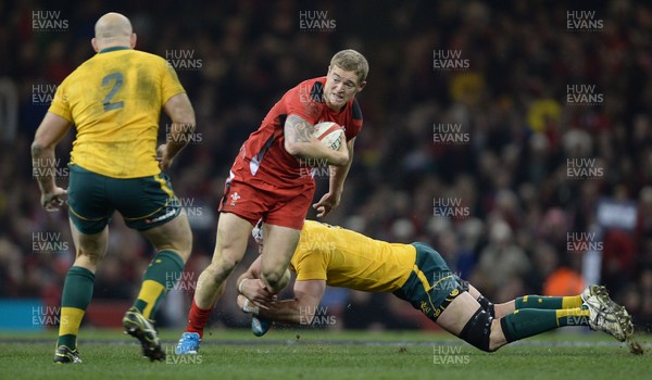 301113 - Wales v Australia - Dove Men Series 2013 -Owen Williams of Wales is tackled by Ben Mowen of Australia