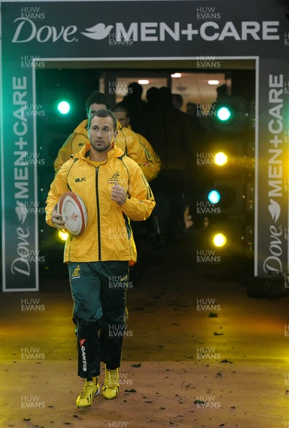 301113 - Wales v Australia - Dove Men Series 2013 -Quade Cooper of Australia leads his team out to win his 50th cap