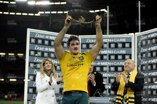 301113 - Wales v Australia - Dove Men Series 2013 -Ben Mowen of Australia lifts the James Bevan Trophy