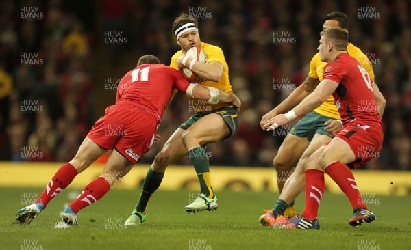 301113 - Wales v Australia - Dove Men Series - Adam Ashley-Cooper of Australia is tackled by George North of Wales 