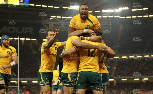 301113 - Wales v Australia - Dove Men Series - Australia celebrate their first try 