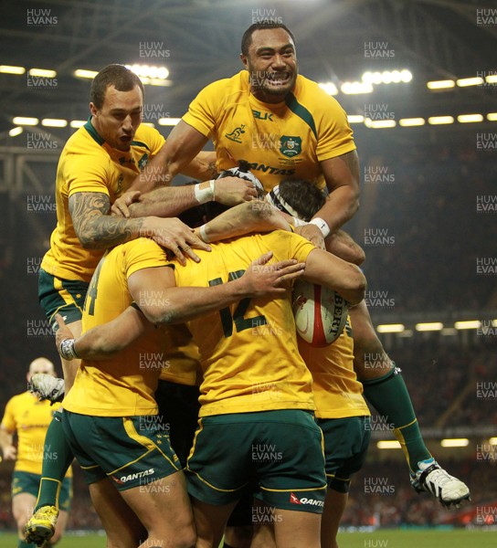 301113 - Wales v Australia - Dove Men Series - Australia celebrate their first try 