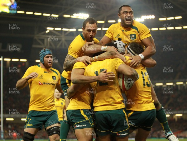 301113 - Wales v Australia - Dove Men Series - Australia celebrate their first try 