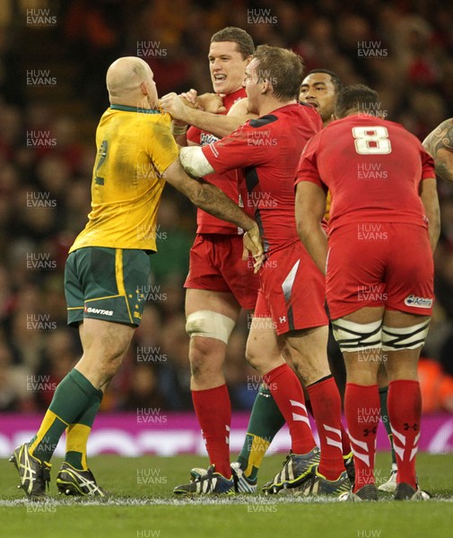 301113 - Wales v Australia - Dove Men Series - Stephen Moore of Australia and Ian Evans of Wales is an altercation during the match 