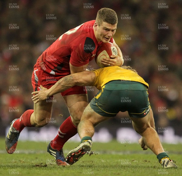 301113 - Wales v Australia - Dove Men Series - Scott Williams of Wales is tackled by Michael Hooper of Australia 