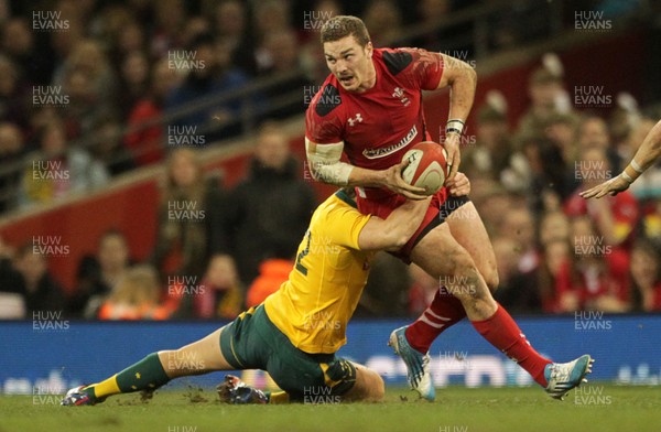 301113 - Wales v Australia - Dove Men Series - George North of Wales is tackled by Christian Leali-ifano of Australia  