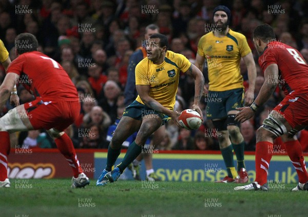 301113 - Wales v Australia - Dove Men+Care Series - Will Genia of Australia looks to pass