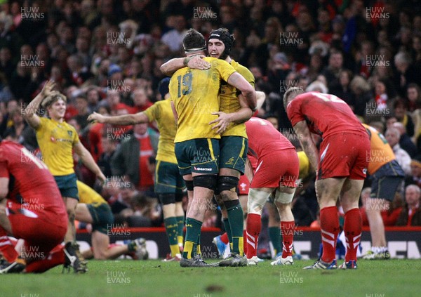 301113 - Wales v Australia - Dove Men+Care Series - Kane Douglas(19) and Rob Simmons of Australia celebrate at the final whislte