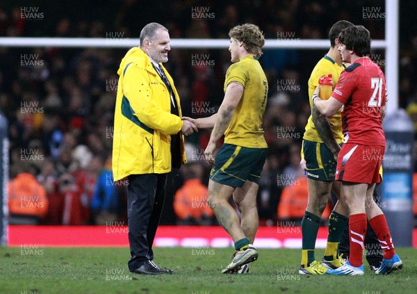 301113 - Wales v Australia - Dove Men+Care Series - Head coaach Ewen Mckenzie Australia congratulates Michael Hooper 