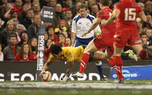 301113 - Wales v Australia, Dove Men Care Autumn Series - Joe Tomane of Australia dives in to score try