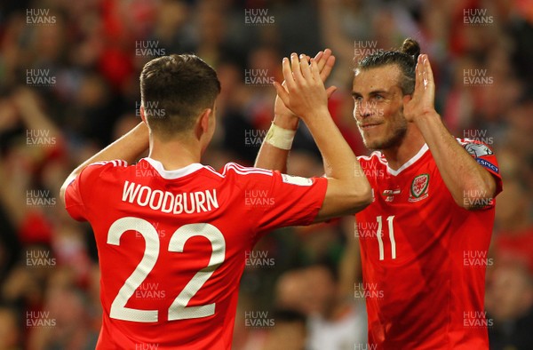 020917 - World Cup Qualifier -  European Group D - Wales v Austria - Ben Woodburn of Wales celebrates his goal with Gareth Bale