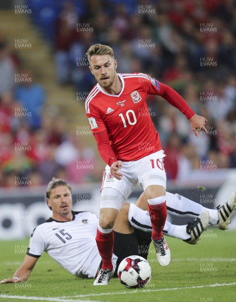 020917 - Wales v Austria, FIFA World Cup 2018 Qualifier - Aaron Ramsey of Wales gets past the challenge from Sebastian Prodl of Austria