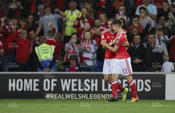 020917 - Wales v Austria, FIFA World Cup 2018 Qualifier - Ben Woodburn of Wales celebrates with Gareth Bale of Wales after scoring goal