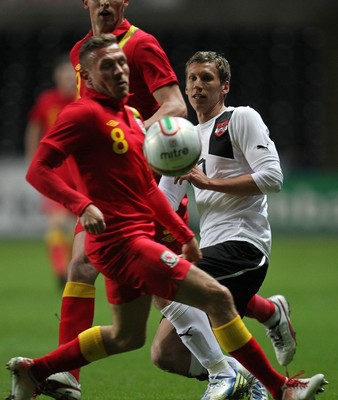 060213 - Wales v Austria, Vauxhall International Friendly Match, Swansea - Wales' Craig Bellamy challenges Austria's Florian Klein