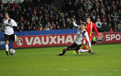 060213 - Wales v Austria, Vauxhall International Friendly Match, Swansea - Wales' Gareth Bale shoots to score goal 