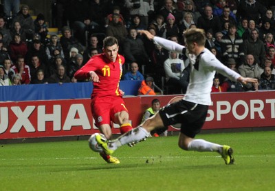060213 - Wales v Austria, Vauxhall International Friendly Match, Swansea - Wales' Gareth Bale shoots to score goal 