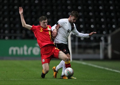 060213 - Wales v Austria, Vauxhall International Friendly Match, Swansea - Wales' Ben Davies challenges Austria's Andreas Weimann