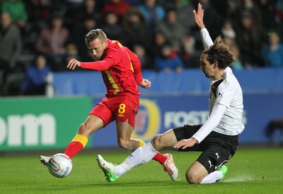 060213 - Wales v Austria, Vauxhall International Friendly Match, Swansea - Wales' Craig Bellamy fires a shot at goal